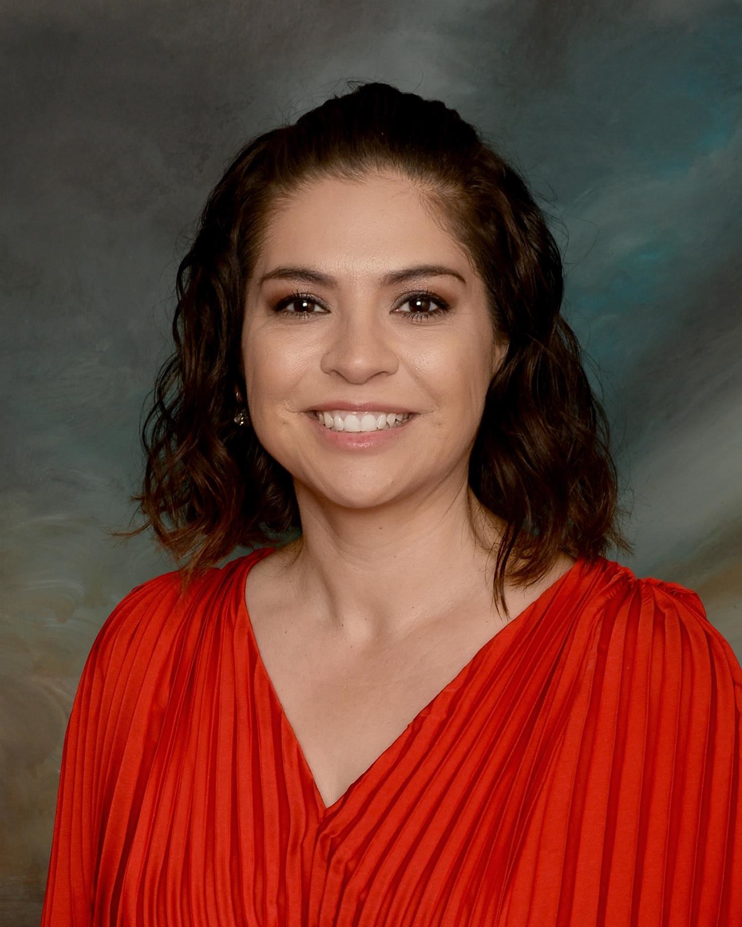 Dr. Carmen Corrales
